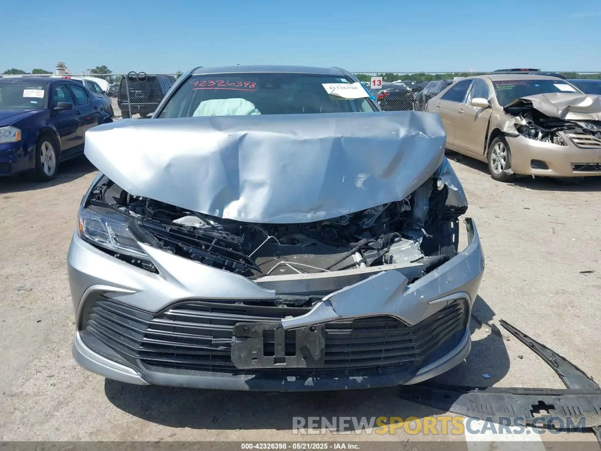 12 Photograph of a damaged car 4T1R11AK3PU800638 TOYOTA CAMRY 2023
