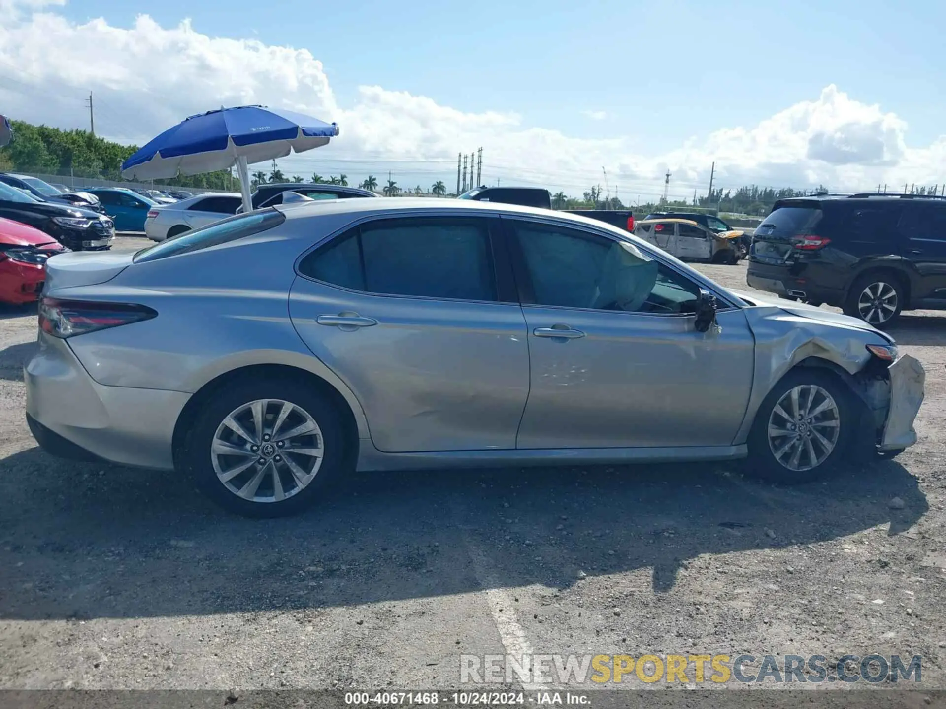 13 Photograph of a damaged car 4T1R11AK4PU102538 TOYOTA CAMRY 2023