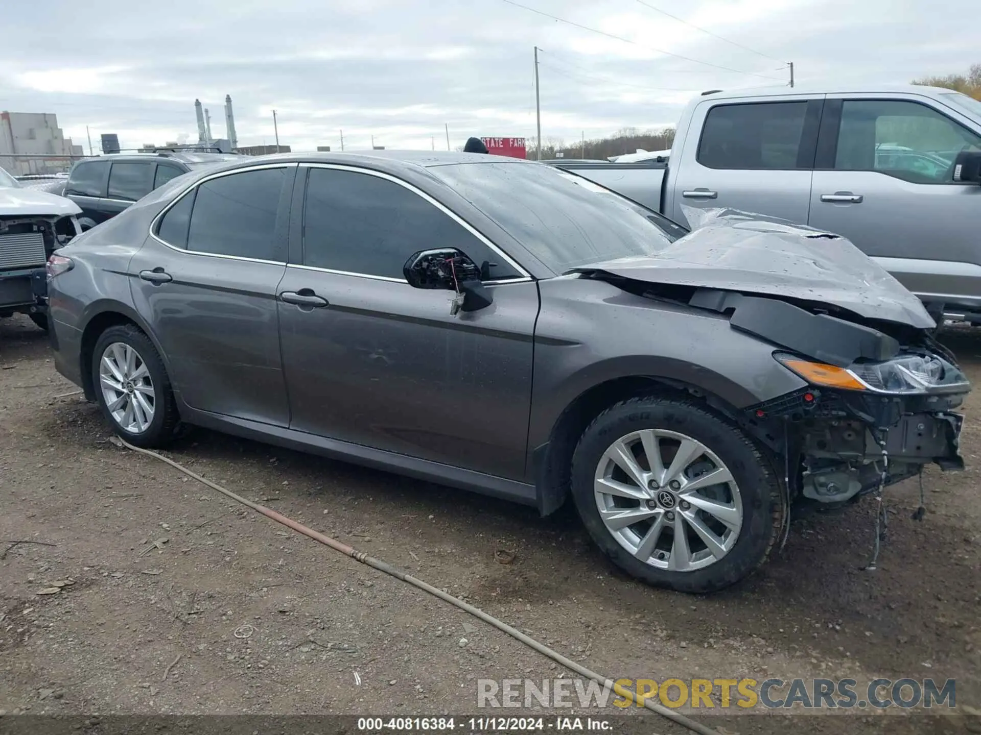 13 Photograph of a damaged car 4T1R11AK4PU132154 TOYOTA CAMRY 2023
