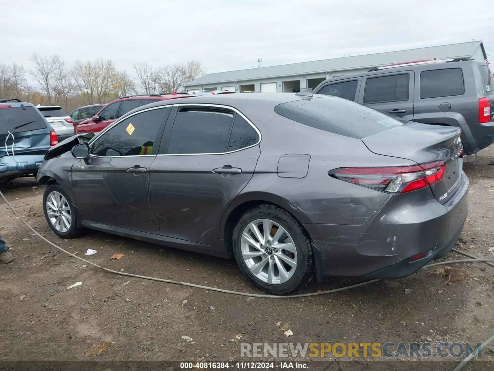 14 Photograph of a damaged car 4T1R11AK4PU132154 TOYOTA CAMRY 2023