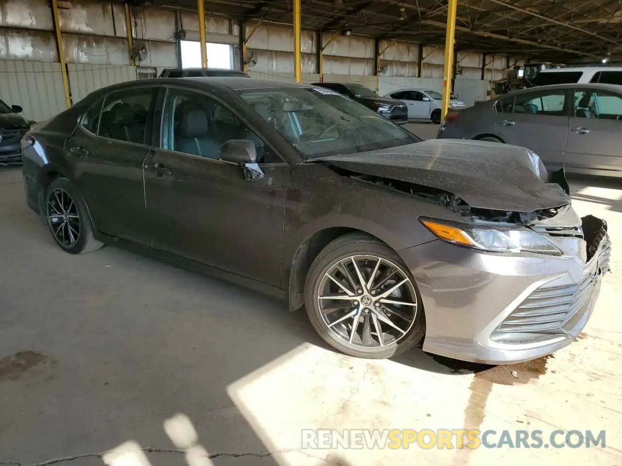 4 Photograph of a damaged car 4T1R11AK4PU785762 TOYOTA CAMRY 2023