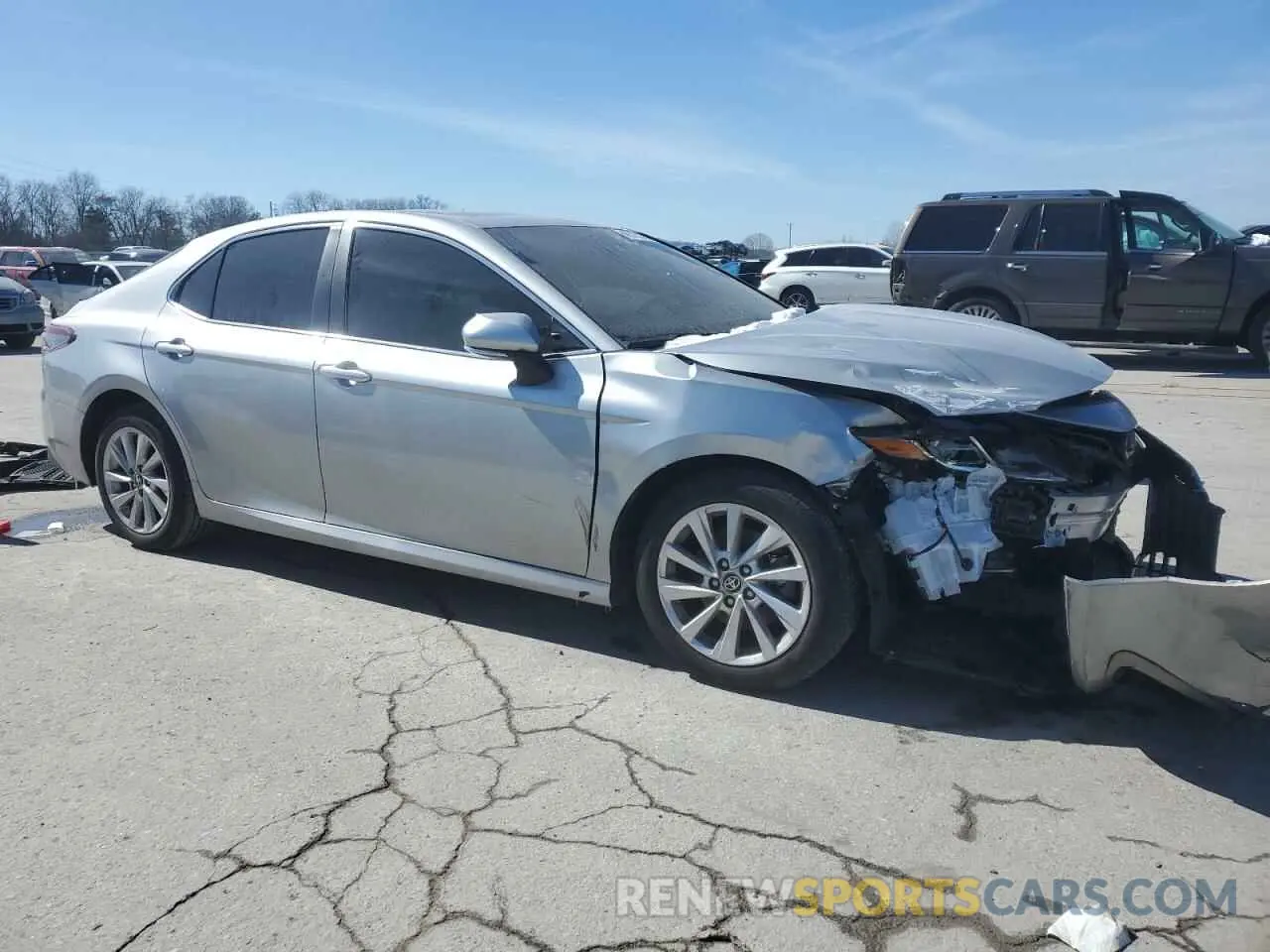 4 Photograph of a damaged car 4T1R11AK6PU093969 TOYOTA CAMRY 2023