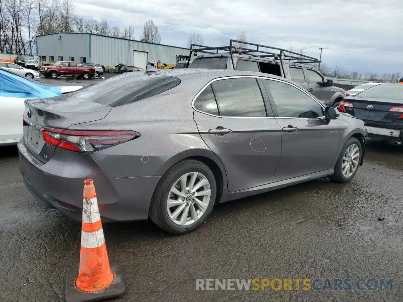 3 Photograph of a damaged car 4T1R11AK6PU752522 TOYOTA CAMRY 2023