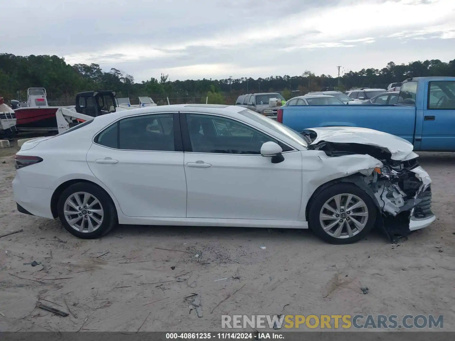 13 Photograph of a damaged car 4T1R11AK6PU761446 TOYOTA CAMRY 2023