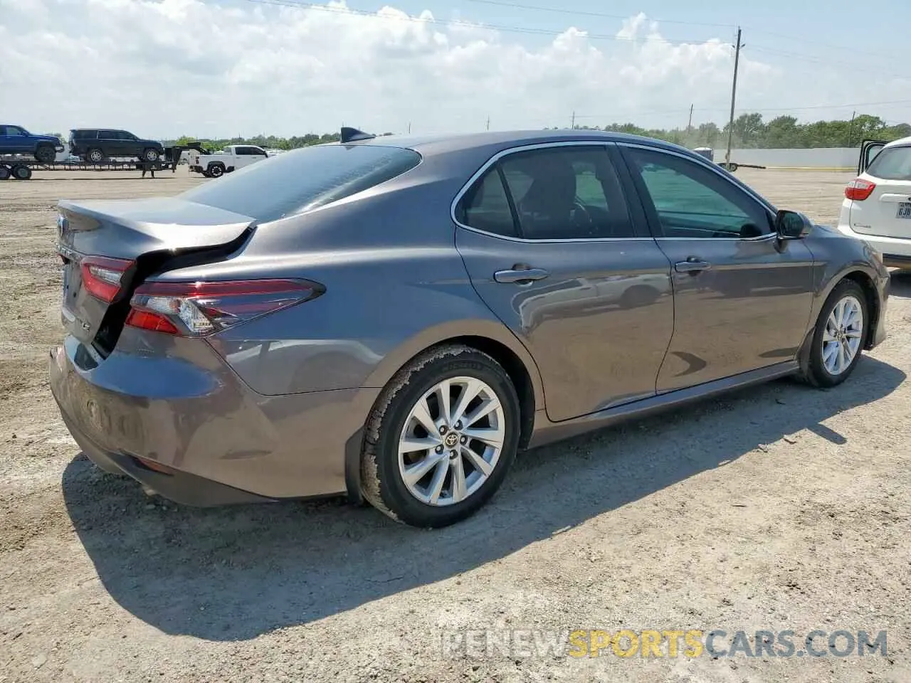 3 Photograph of a damaged car 4T1R11AK6PU779140 TOYOTA CAMRY 2023