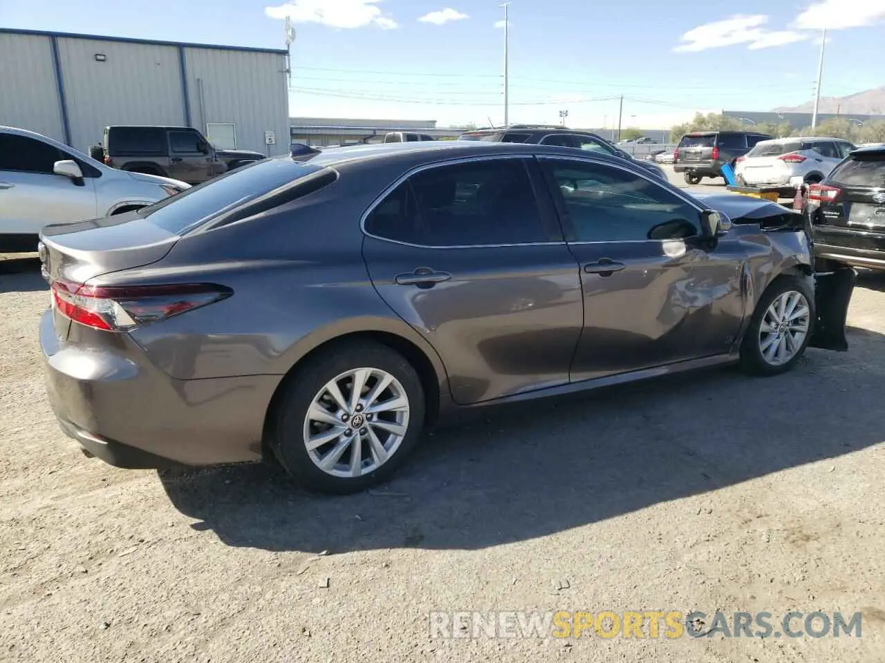 3 Photograph of a damaged car 4T1R11AK8PU756619 TOYOTA CAMRY 2023