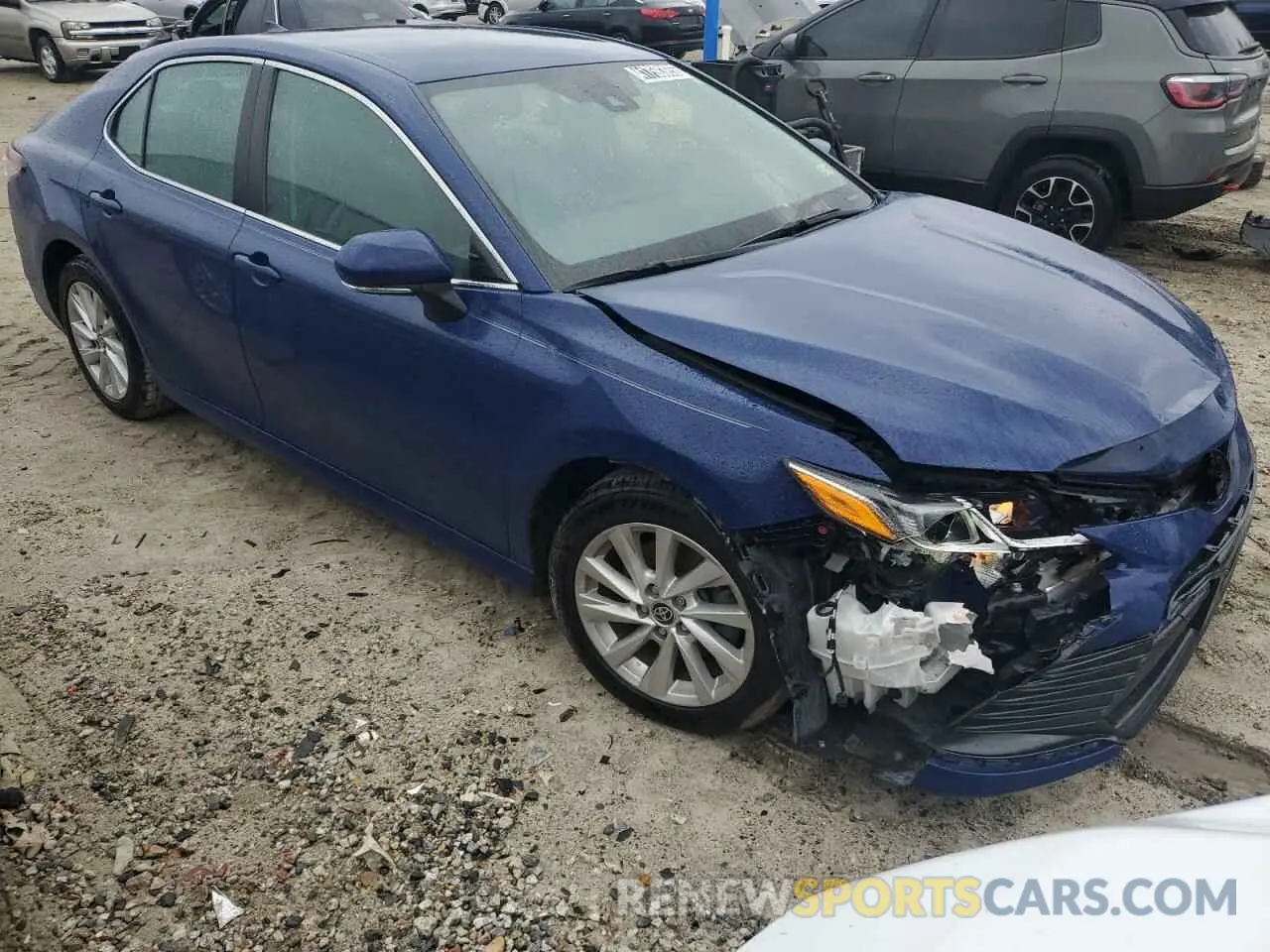4 Photograph of a damaged car 4T1R11AK9PU141853 TOYOTA CAMRY 2023