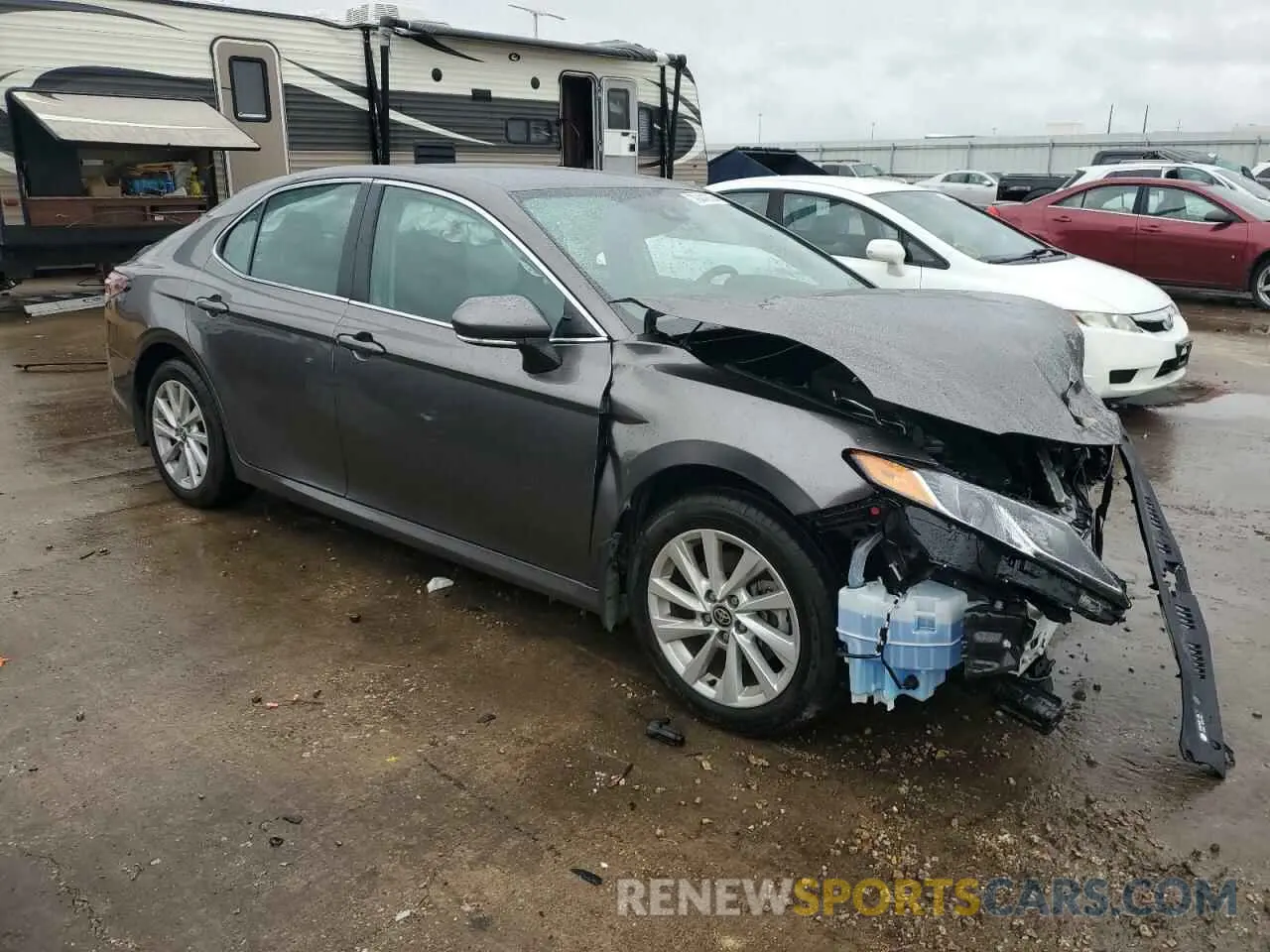 4 Photograph of a damaged car 4T1R11BK5PU106029 TOYOTA CAMRY 2023