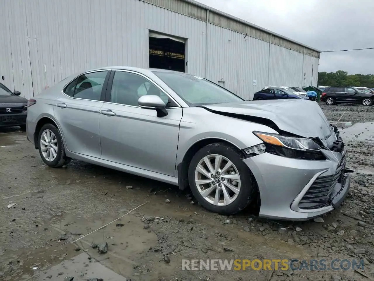 4 Photograph of a damaged car 4T1R11BKXPU096050 TOYOTA CAMRY 2023