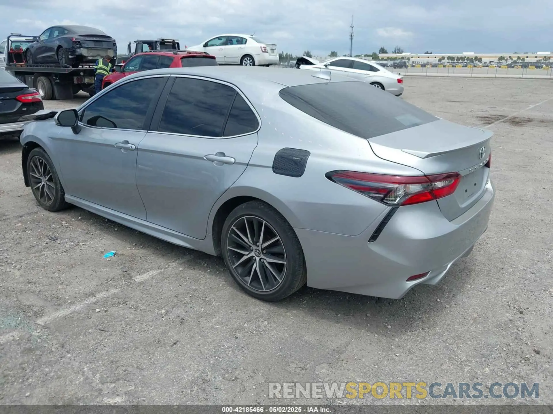 3 Photograph of a damaged car 4T1S11AK6PU134957 TOYOTA CAMRY 2023