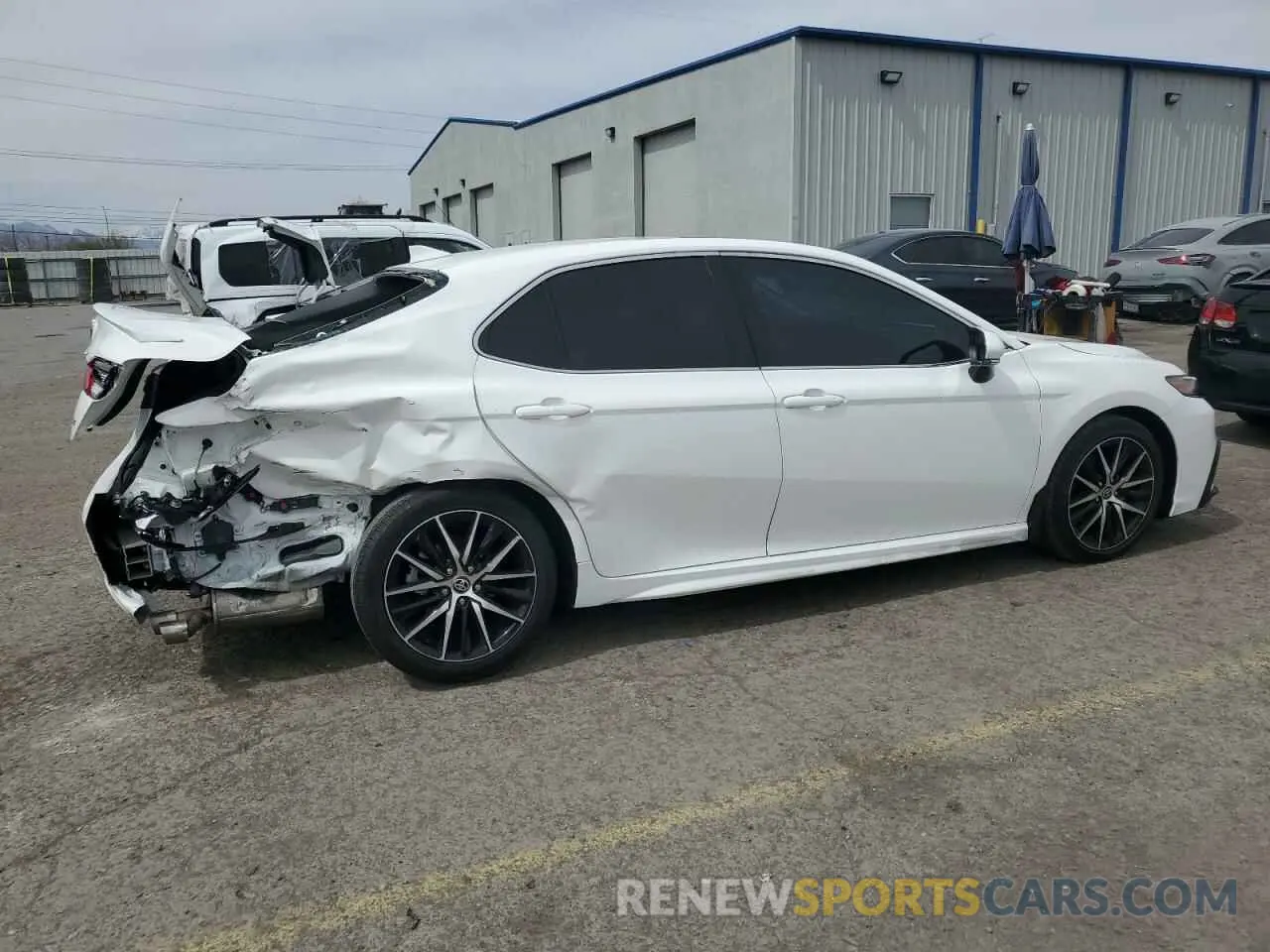 3 Photograph of a damaged car 4T1S11AK8PU149931 TOYOTA CAMRY 2023