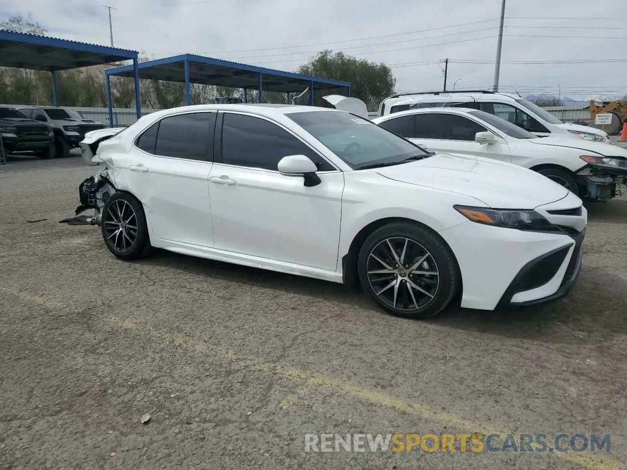 4 Photograph of a damaged car 4T1S11AK8PU149931 TOYOTA CAMRY 2023