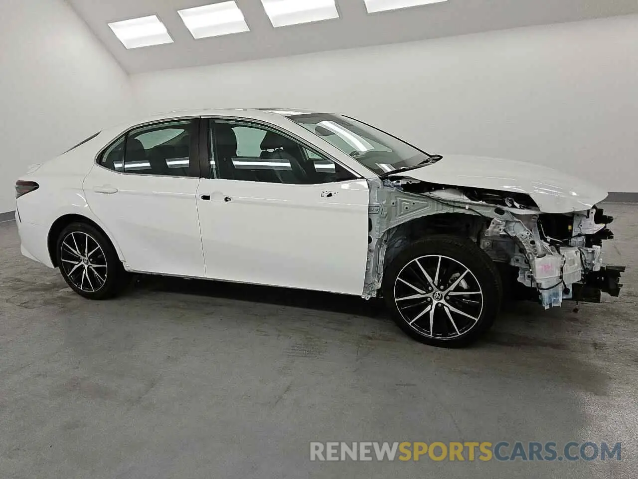 4 Photograph of a damaged car 4T1S11AKXPU184633 TOYOTA CAMRY 2023