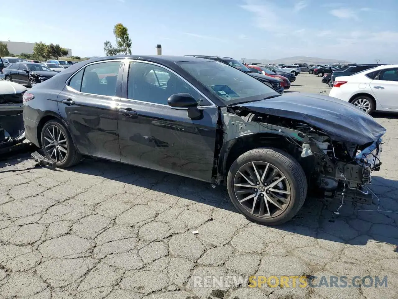 4 Photograph of a damaged car 4T1S11AKXPU798291 TOYOTA CAMRY 2023
