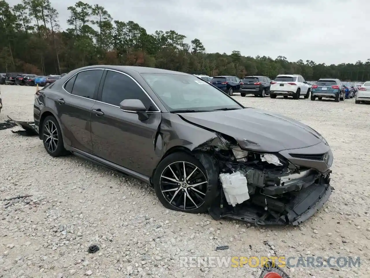 4 Photograph of a damaged car 4T1T11AK0PU722227 TOYOTA CAMRY 2023