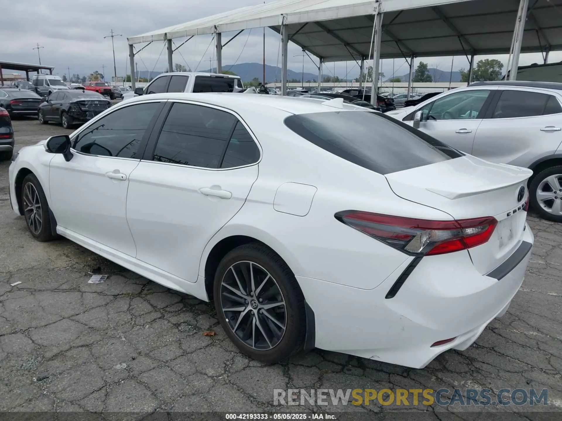 3 Photograph of a damaged car 4T1T11AK0PU829763 TOYOTA CAMRY 2023