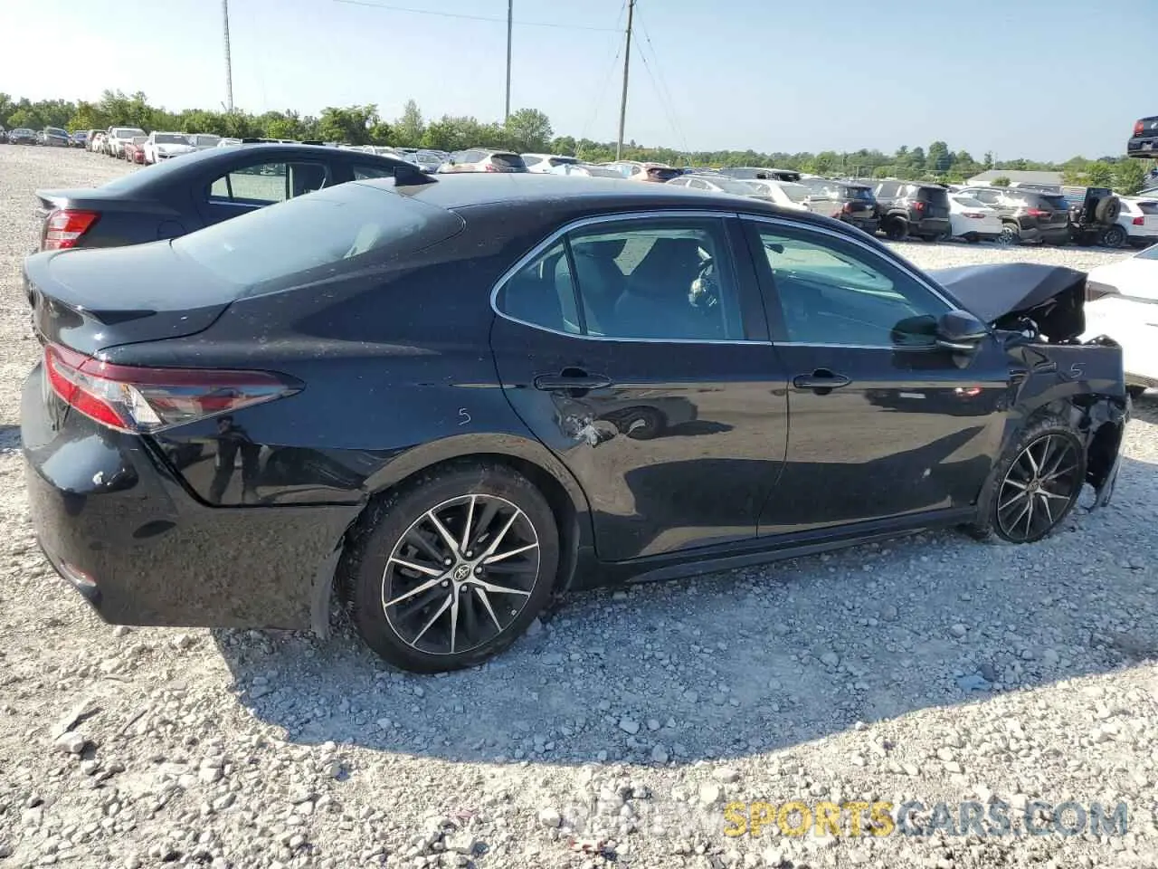 3 Photograph of a damaged car 4T1T11AK1PU746309 TOYOTA CAMRY 2023