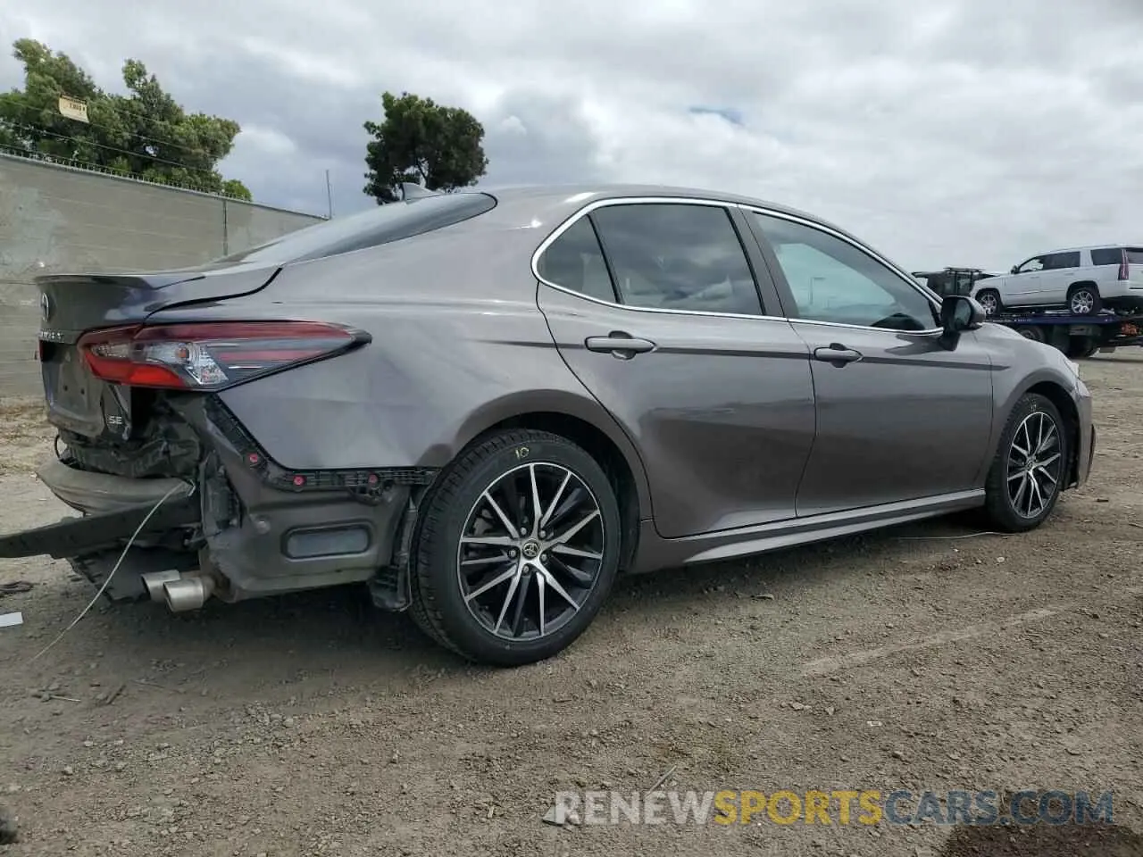 3 Photograph of a damaged car 4T1T11AK1PU774966 TOYOTA CAMRY 2023