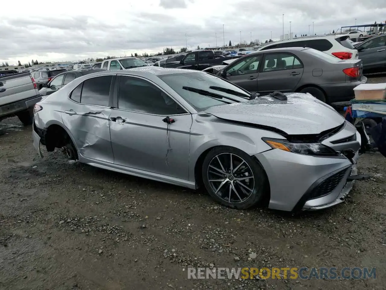 4 Photograph of a damaged car 4T1T11AK1PU803768 TOYOTA CAMRY 2023
