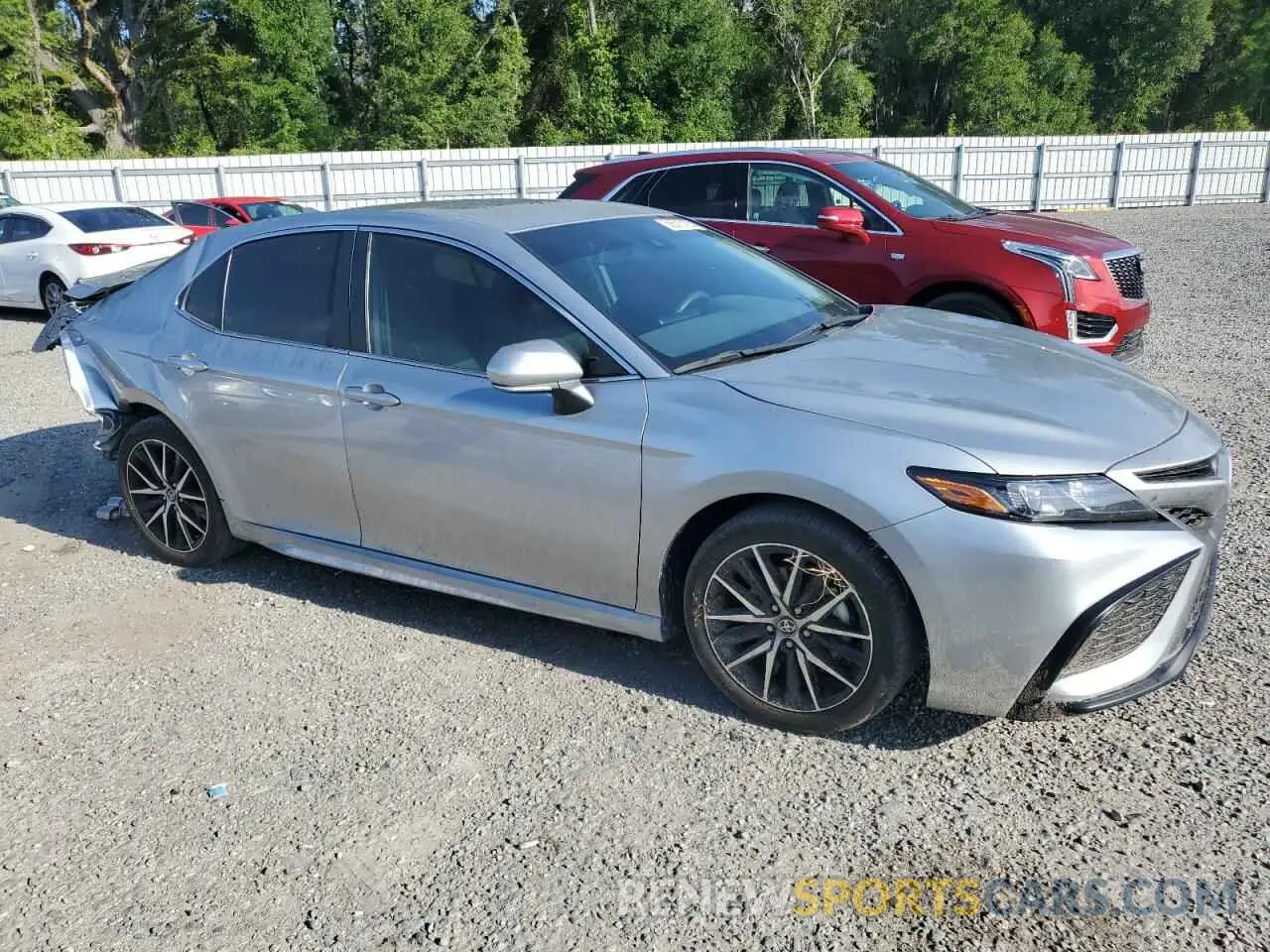 4 Photograph of a damaged car 4T1T11AK1PU835832 TOYOTA CAMRY 2023