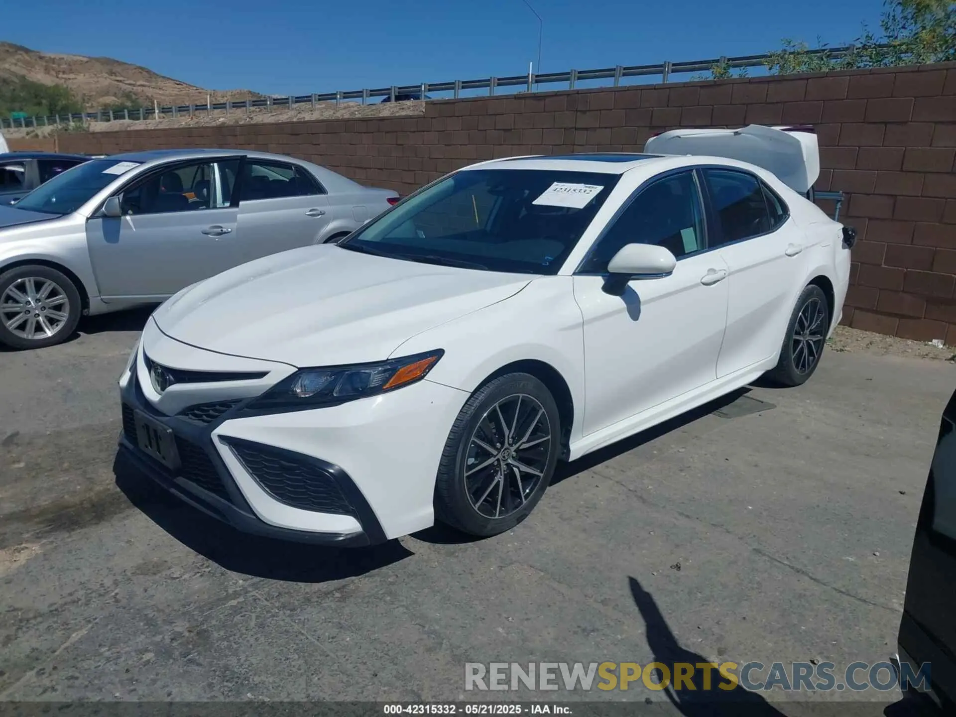 2 Photograph of a damaged car 4T1T11AK2PU747789 TOYOTA CAMRY 2023