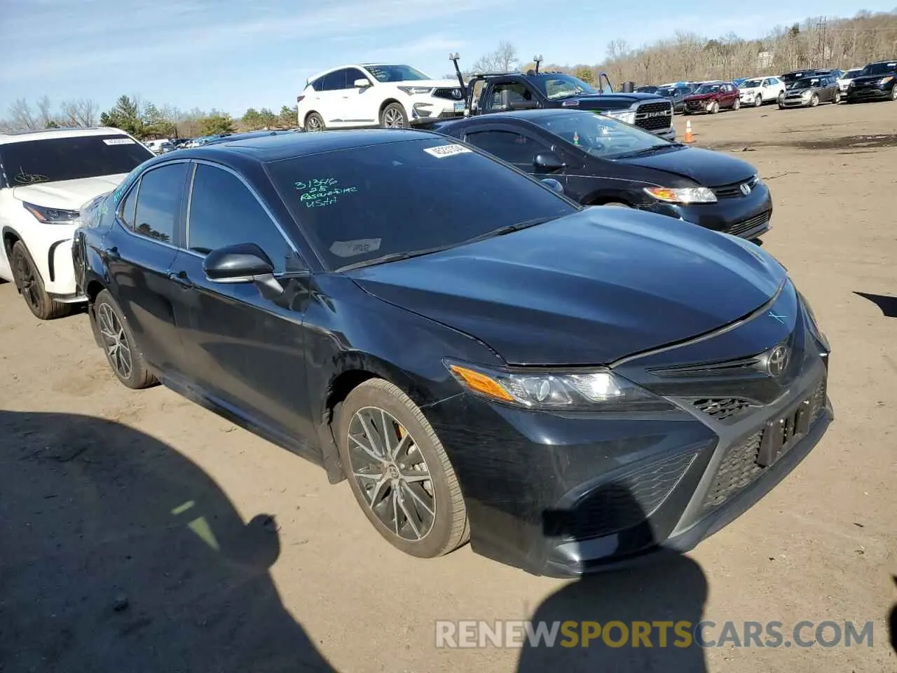4 Photograph of a damaged car 4T1T11AK2PU773261 TOYOTA CAMRY 2023
