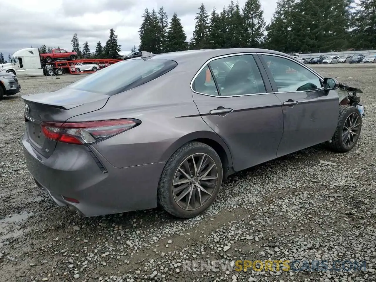 3 Photograph of a damaged car 4T1T11AK2PU823771 TOYOTA CAMRY 2023