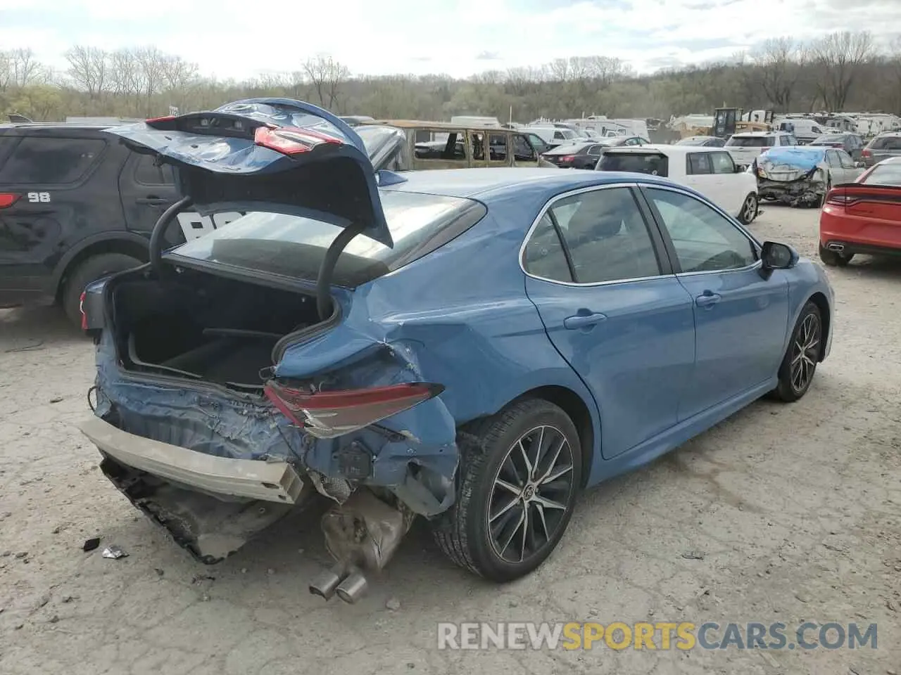3 Photograph of a damaged car 4T1T11AK3PU093143 TOYOTA CAMRY 2023