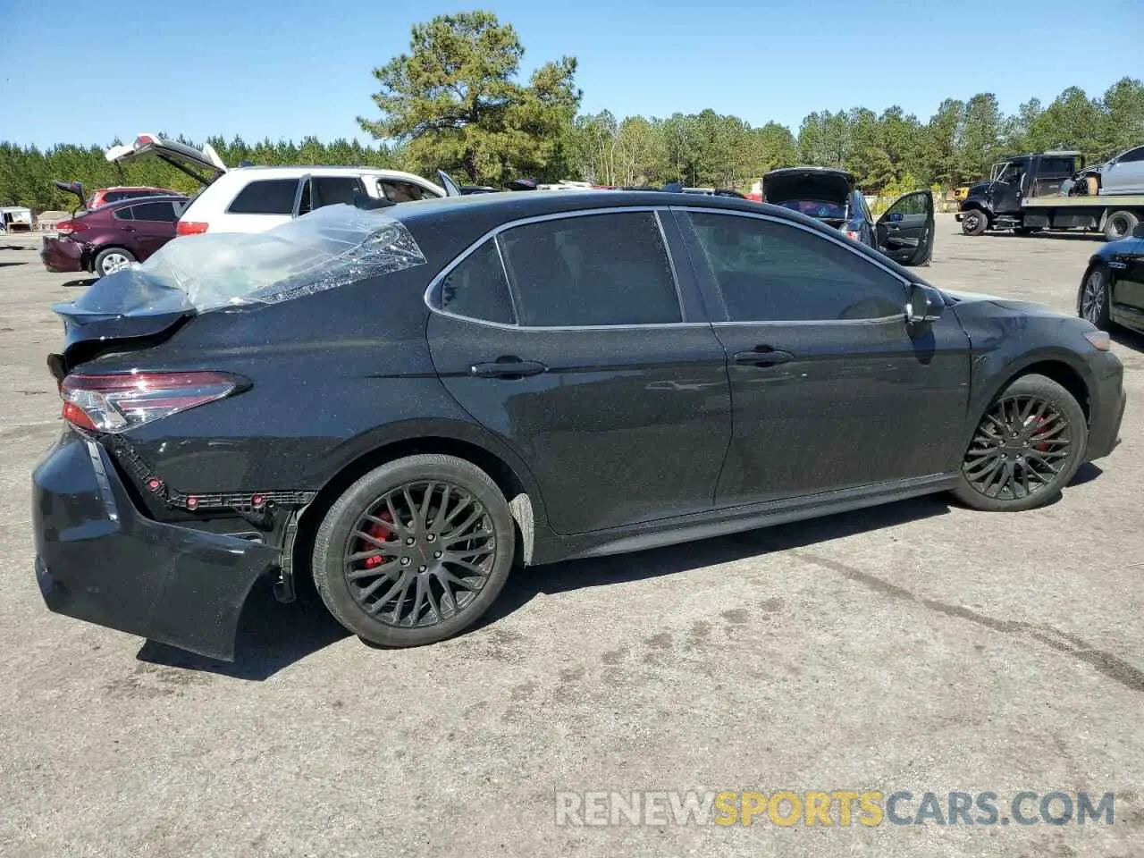 3 Photograph of a damaged car 4T1T11AK3PU803626 TOYOTA CAMRY 2023
