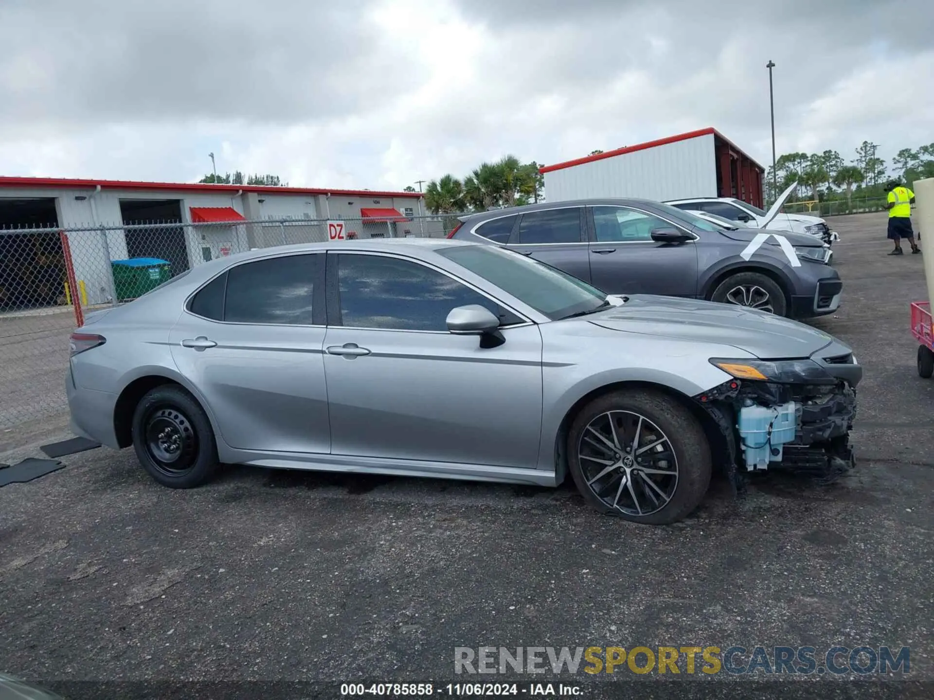 13 Photograph of a damaged car 4T1T11AK3PU821012 TOYOTA CAMRY 2023