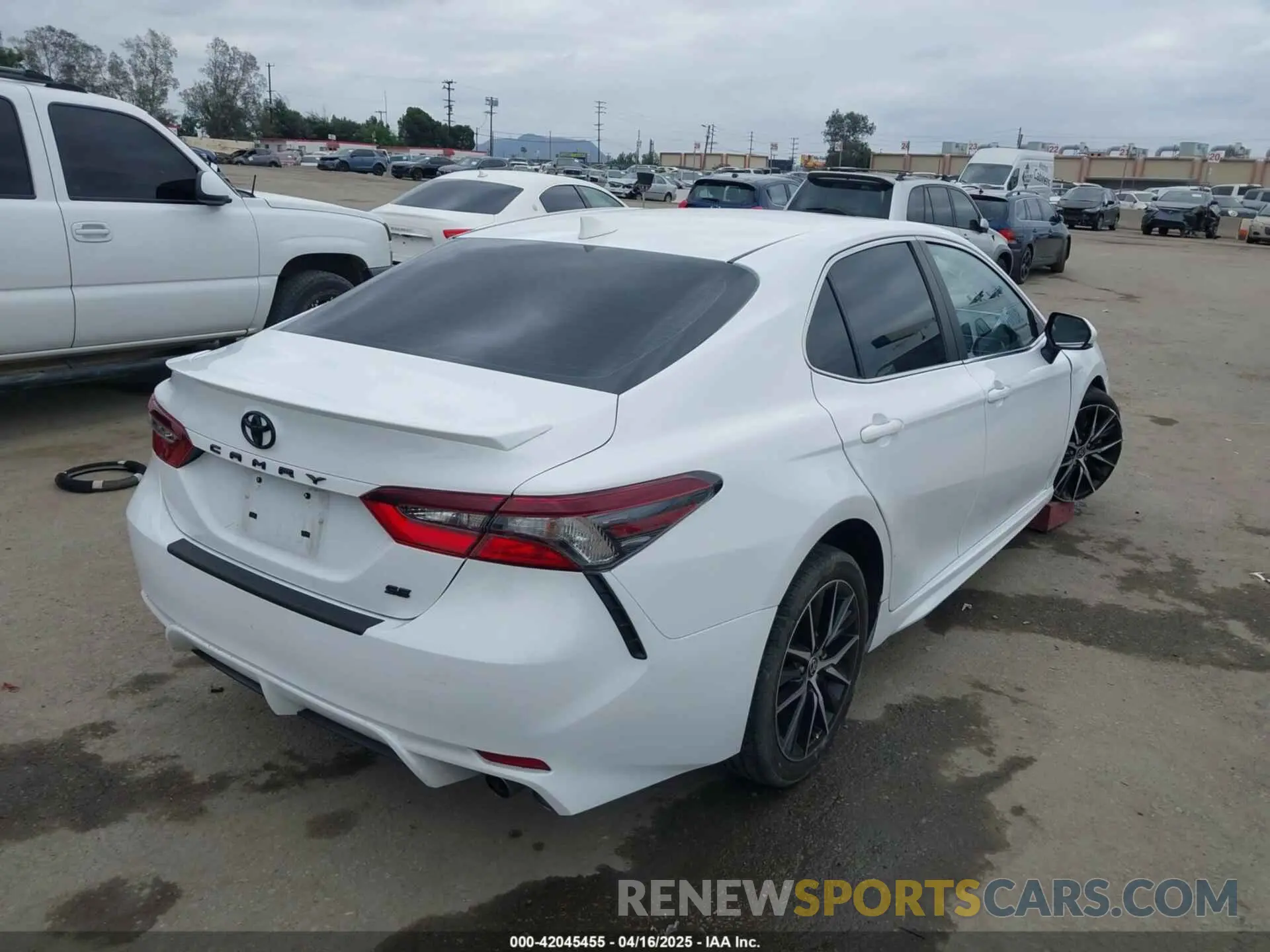 4 Photograph of a damaged car 4T1T11AK4PU777487 TOYOTA CAMRY 2023