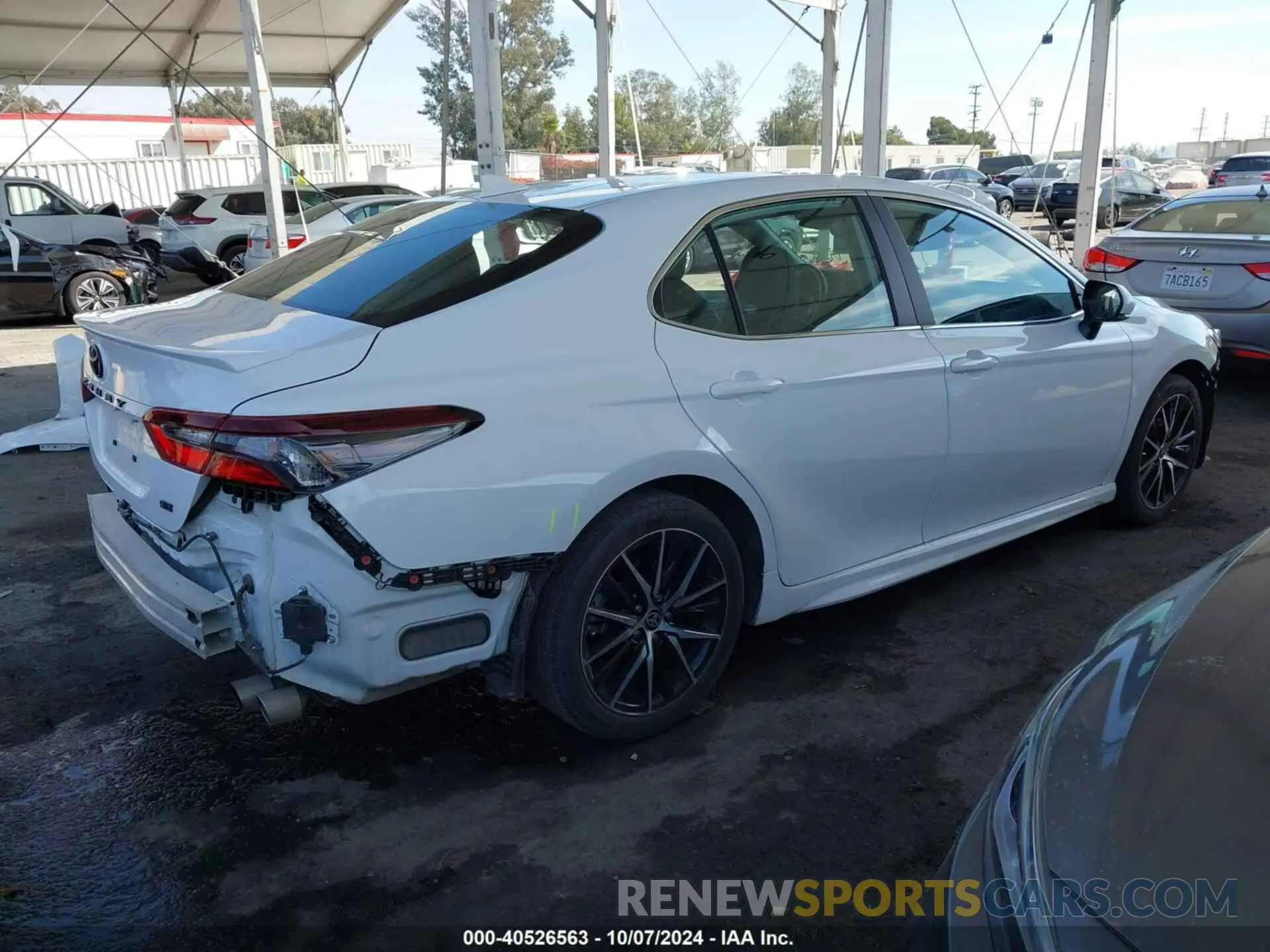 4 Photograph of a damaged car 4T1T11AK5PU817592 TOYOTA CAMRY 2023