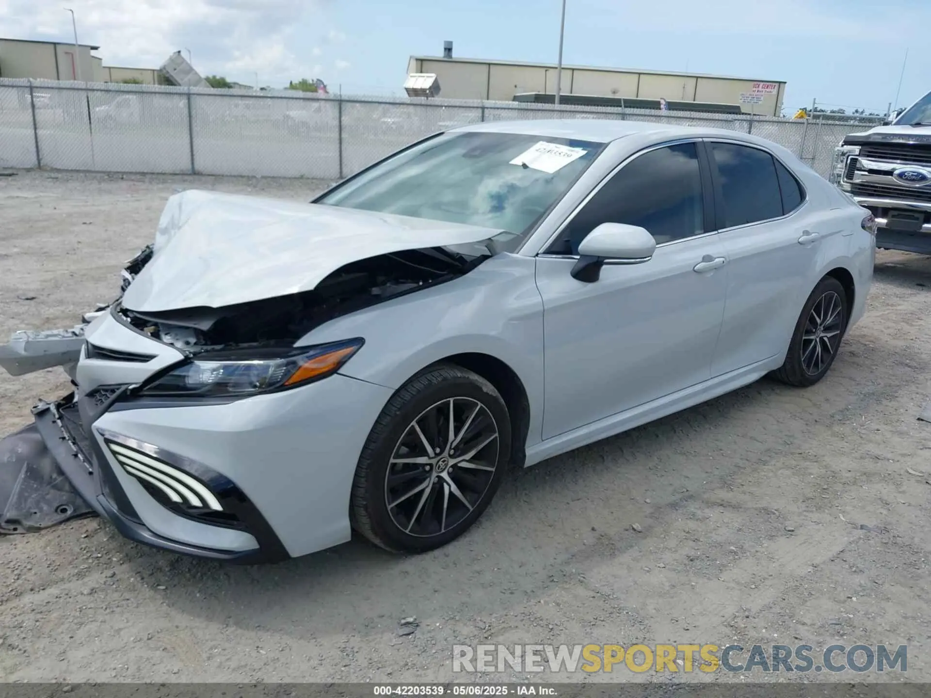 2 Photograph of a damaged car 4T1T11AK6PU143727 TOYOTA CAMRY 2023