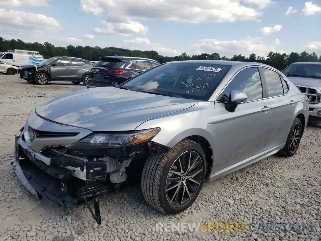 2 Photograph of a damaged car 4T1T11AK6PU721339 TOYOTA CAMRY 2023