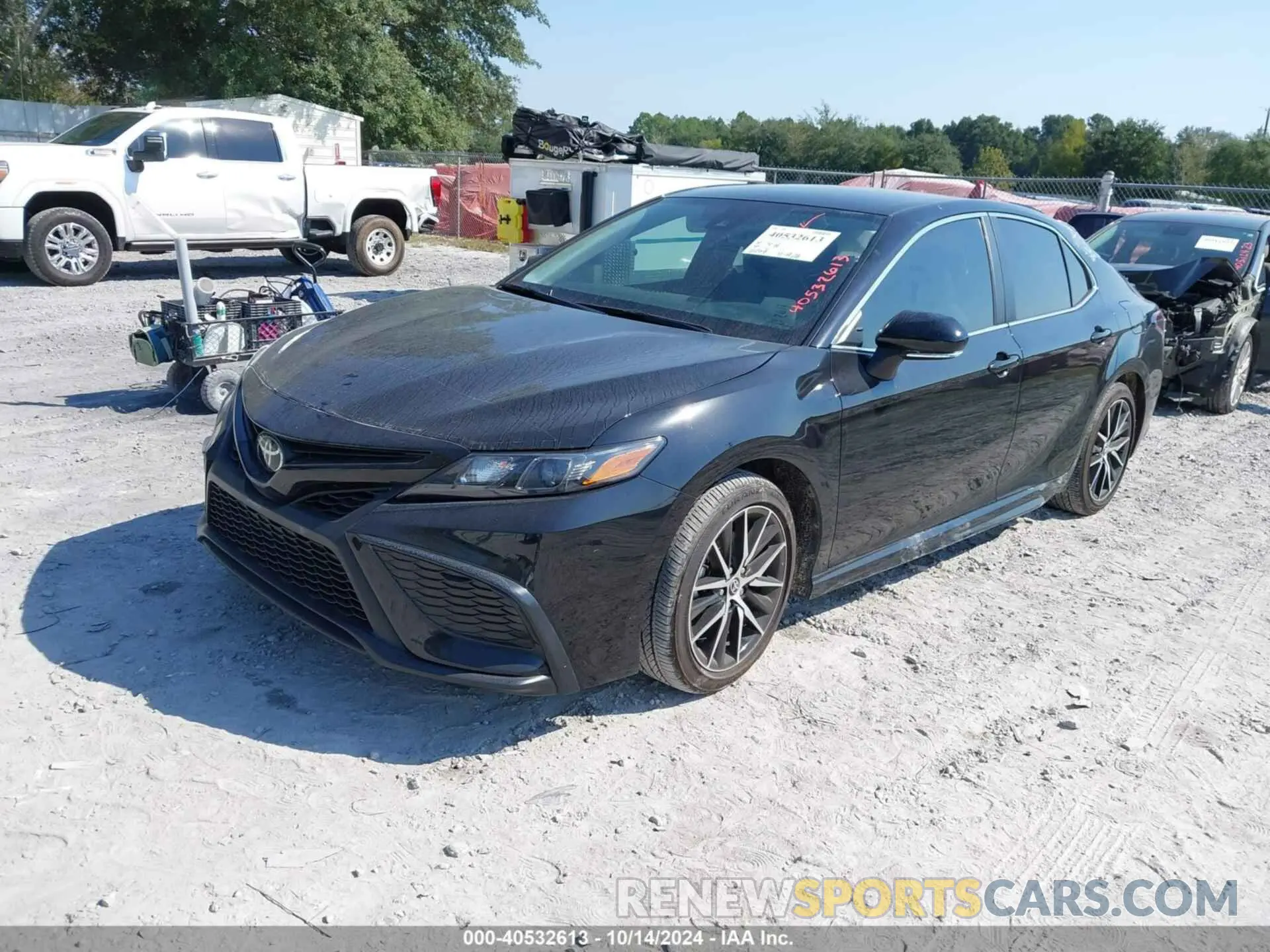 2 Photograph of a damaged car 4T1T11AK6PU753613 TOYOTA CAMRY 2023