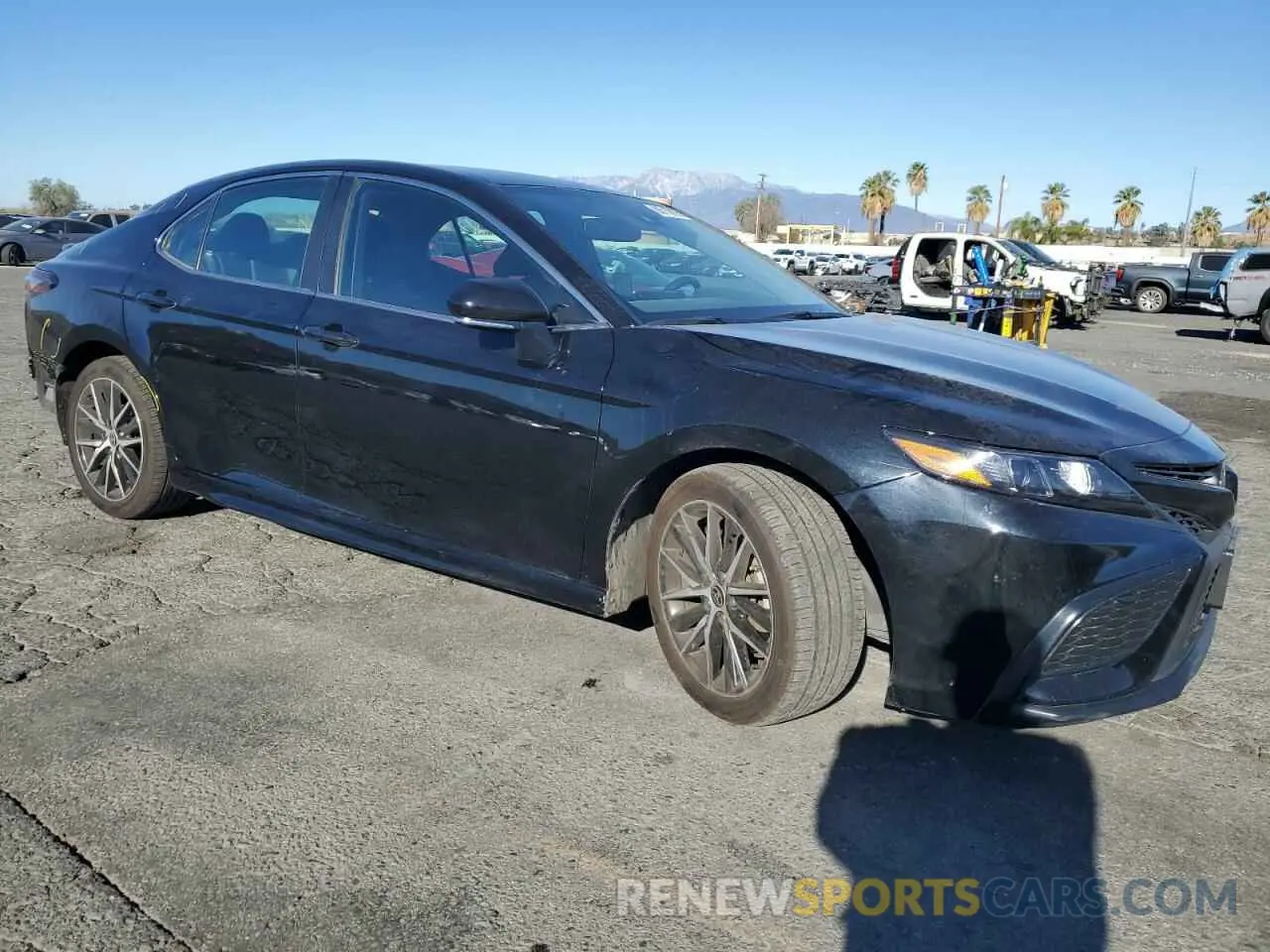 4 Photograph of a damaged car 4T1T11AK6PU807685 TOYOTA CAMRY 2023