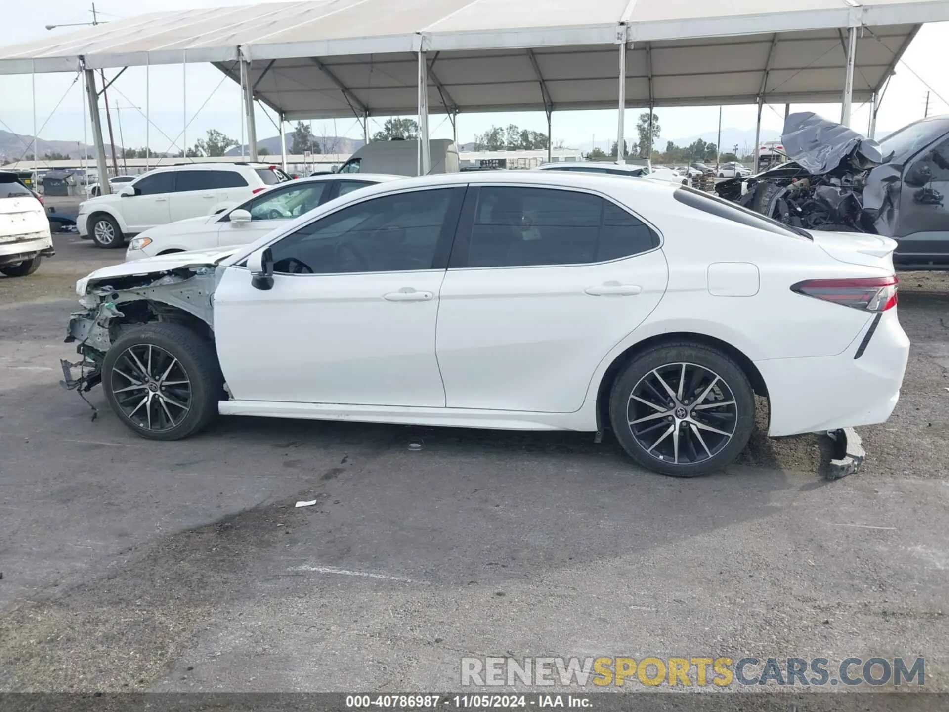 15 Photograph of a damaged car 4T1T11AK6PU809971 TOYOTA CAMRY 2023