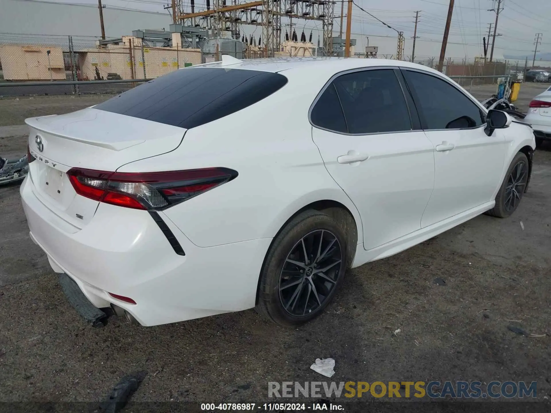 4 Photograph of a damaged car 4T1T11AK6PU809971 TOYOTA CAMRY 2023