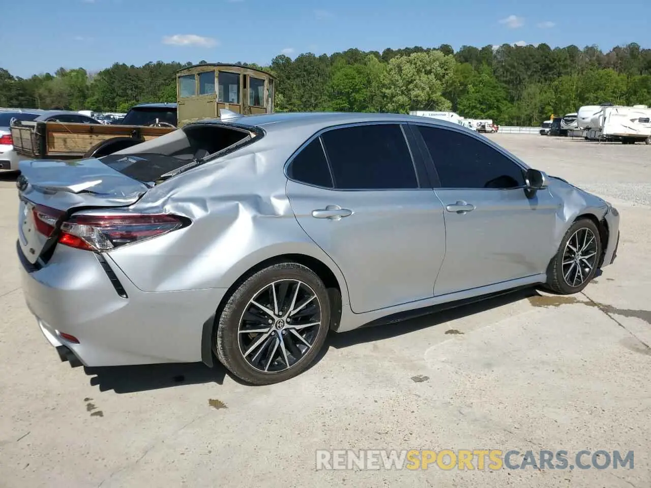 3 Photograph of a damaged car 4T1T11AK7PU091718 TOYOTA CAMRY 2023