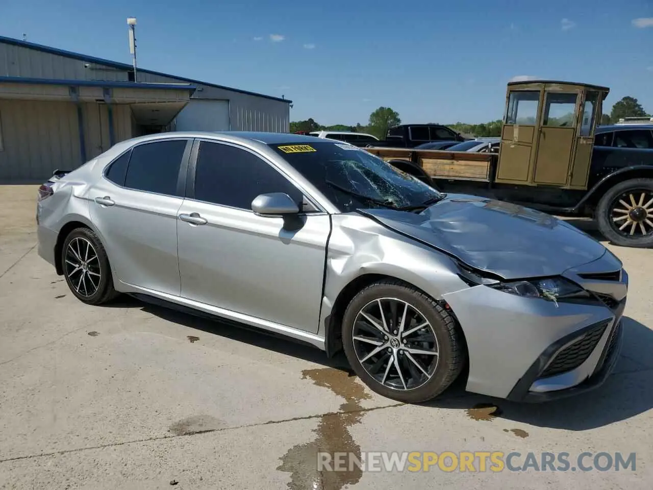 4 Photograph of a damaged car 4T1T11AK7PU091718 TOYOTA CAMRY 2023