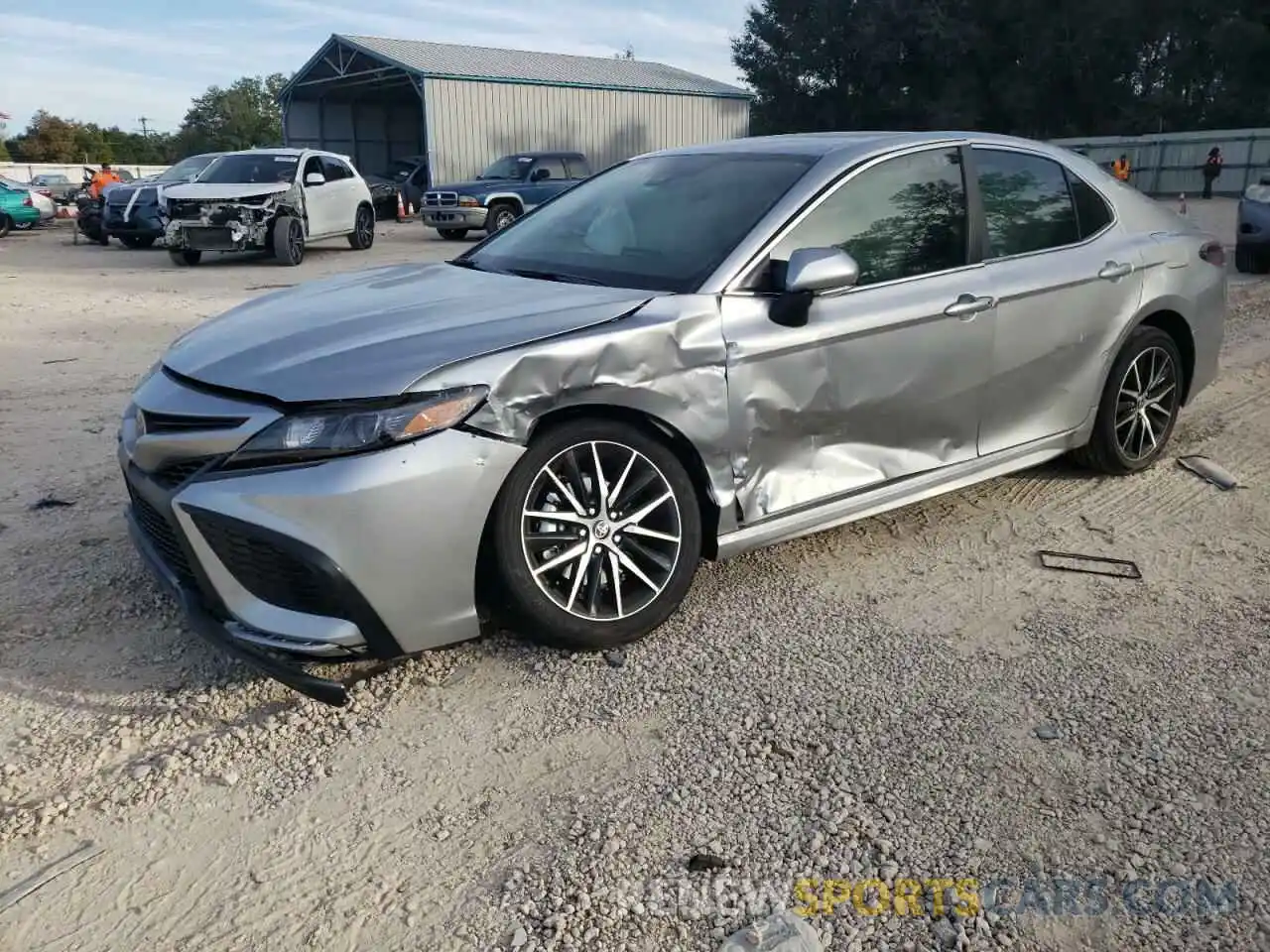 2 Photograph of a damaged car 4T1T11AK7PU730938 TOYOTA CAMRY 2023