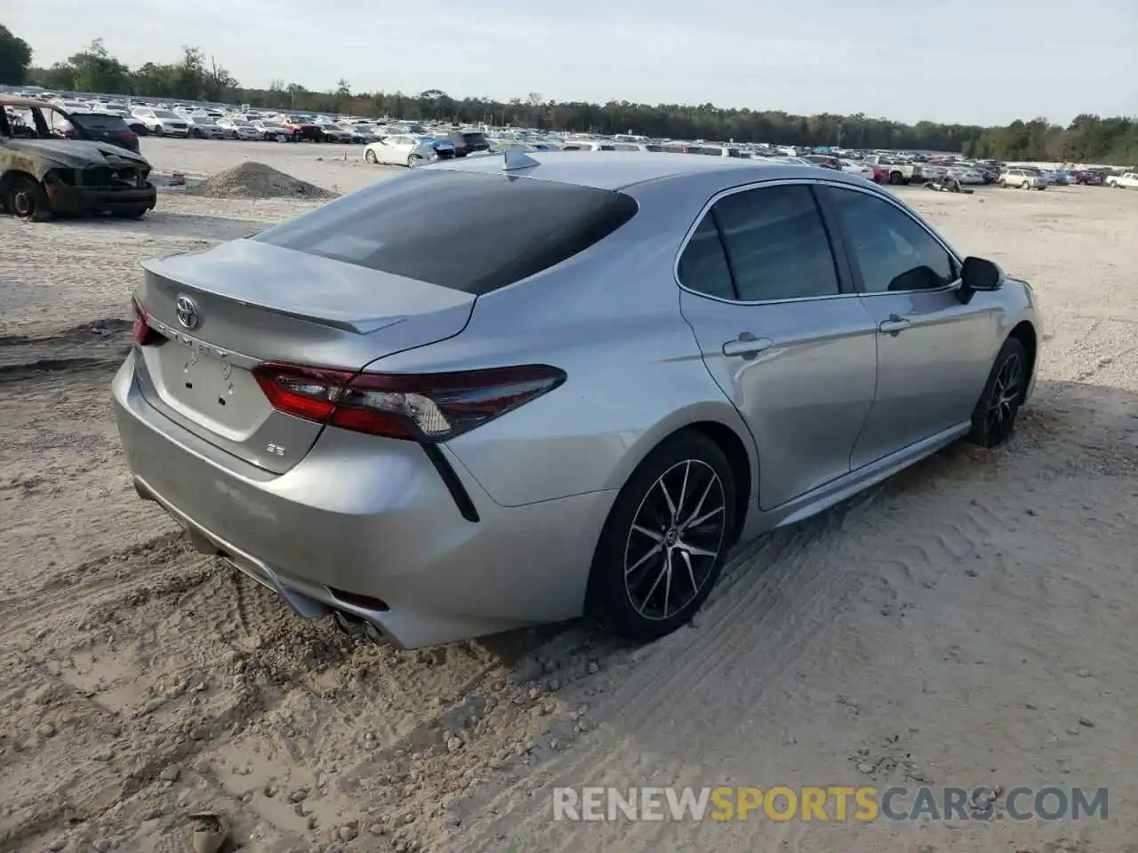 4 Photograph of a damaged car 4T1T11AK7PU730938 TOYOTA CAMRY 2023