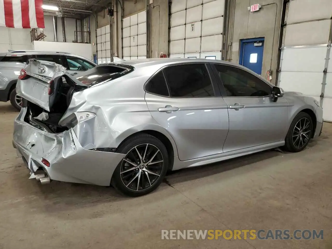3 Photograph of a damaged car 4T1T11AK7PU768332 TOYOTA CAMRY 2023