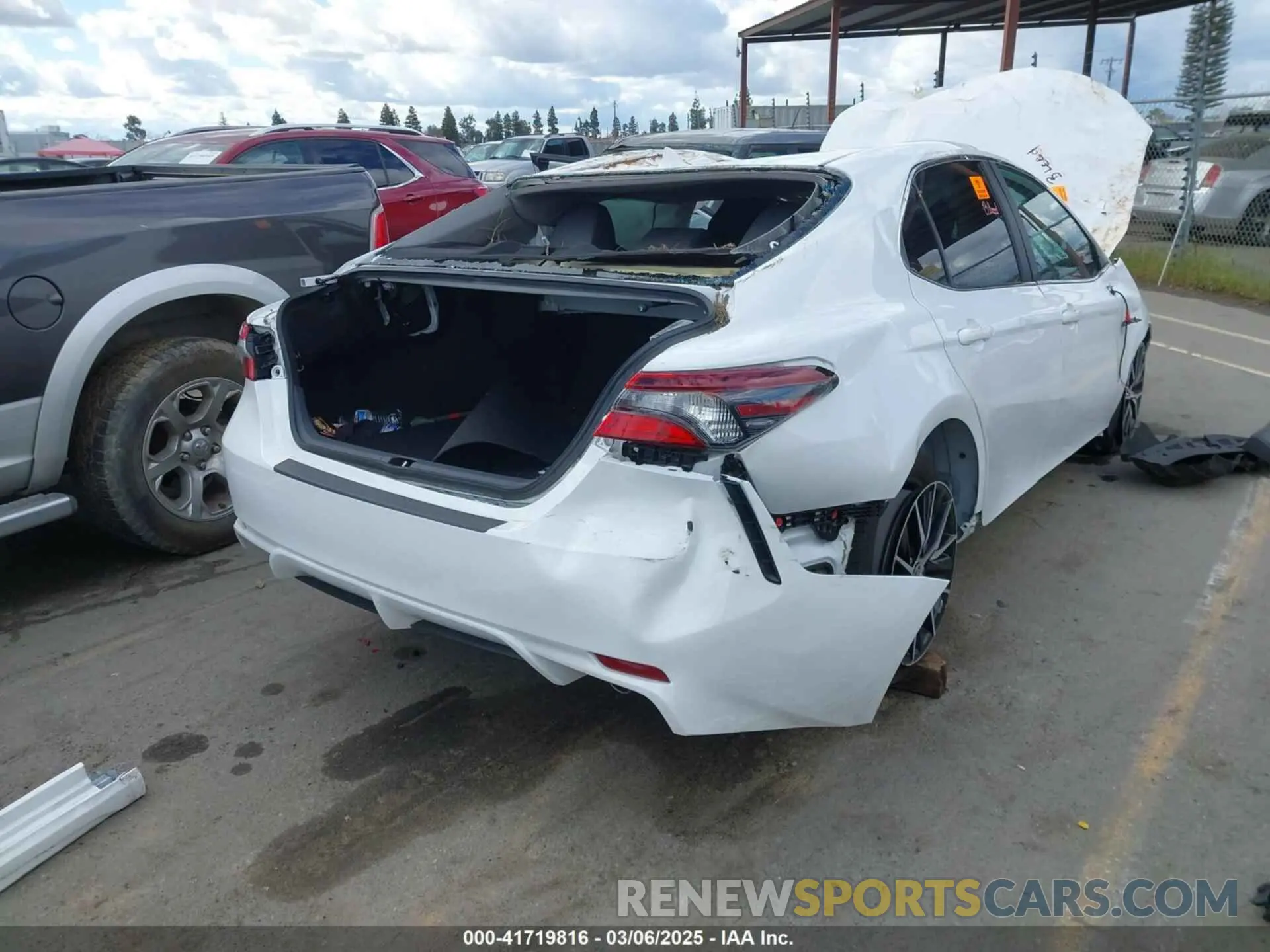 4 Photograph of a damaged car 4T1T11AK7PU818257 TOYOTA CAMRY 2023