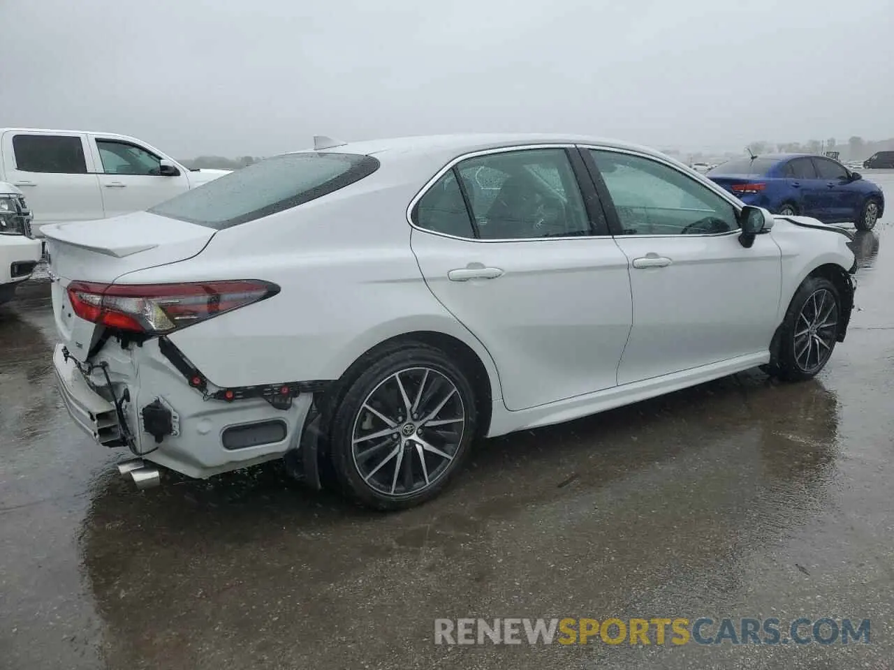 3 Photograph of a damaged car 4T1T11AK8PU125164 TOYOTA CAMRY 2023
