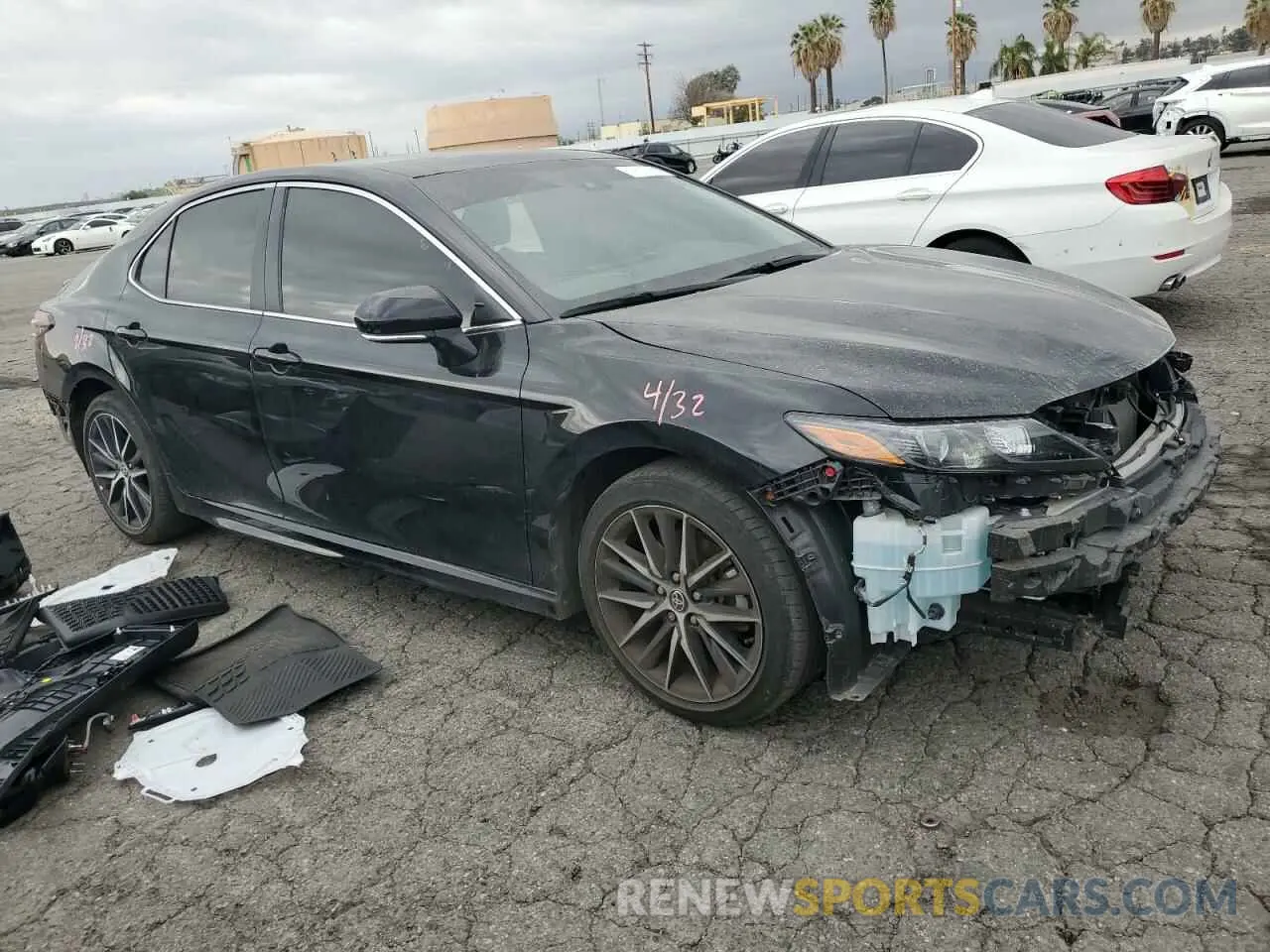 4 Photograph of a damaged car 4T1T11AK8PU170007 TOYOTA CAMRY 2023