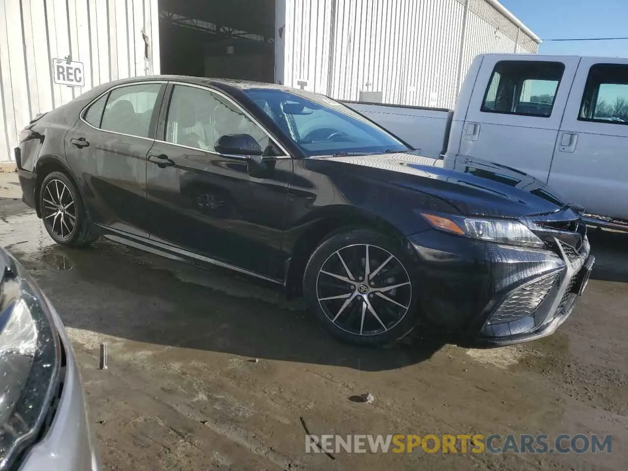 4 Photograph of a damaged car 4T1T11AK8PU733721 TOYOTA CAMRY 2023