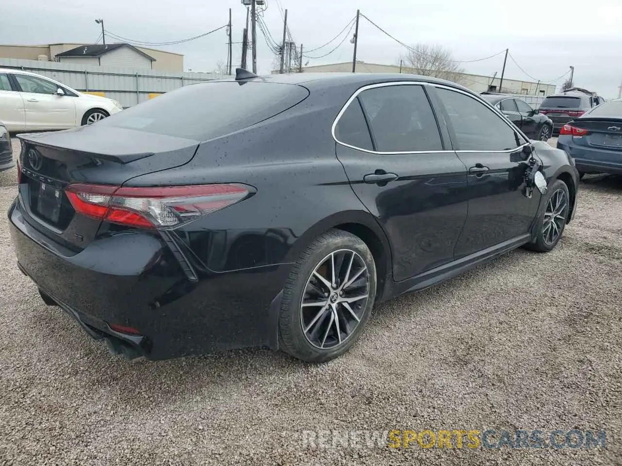 3 Photograph of a damaged car 4T1T11AK8PU744914 TOYOTA CAMRY 2023