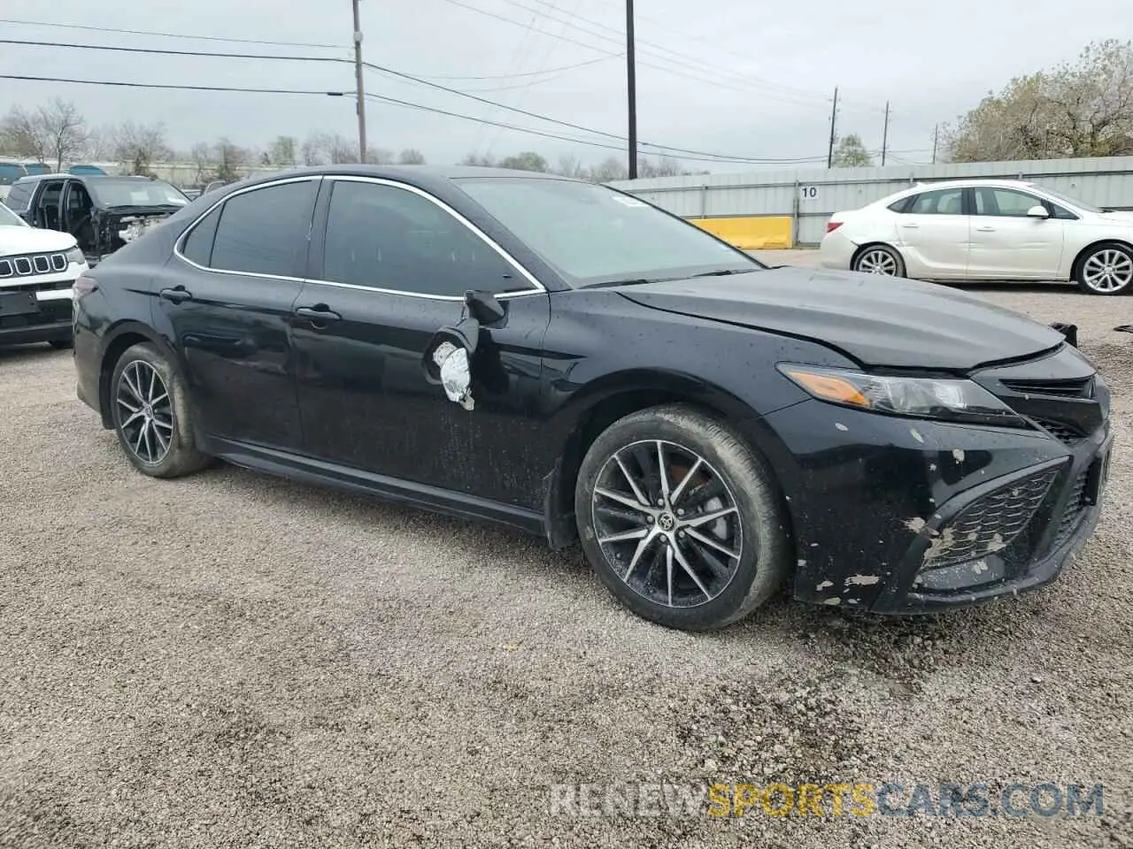 4 Photograph of a damaged car 4T1T11AK8PU744914 TOYOTA CAMRY 2023