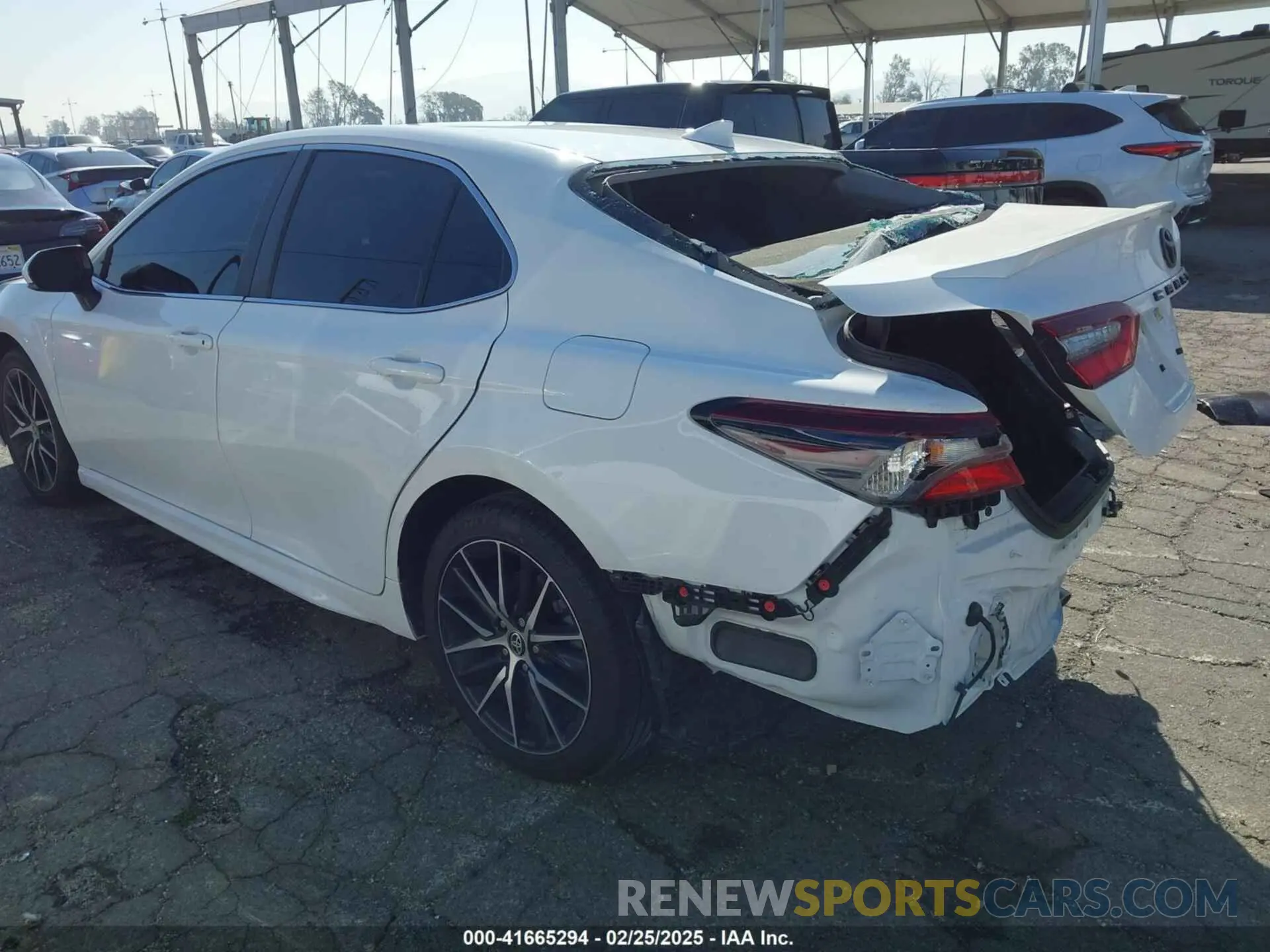 3 Photograph of a damaged car 4T1T11AK8PU833348 TOYOTA CAMRY 2023